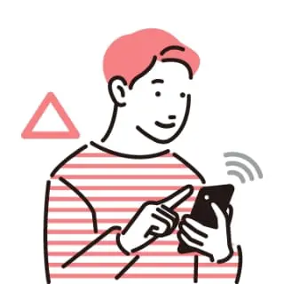 携帯で予約をしている様子